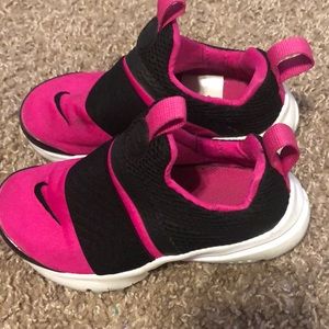 Hot pink and black Nike’s